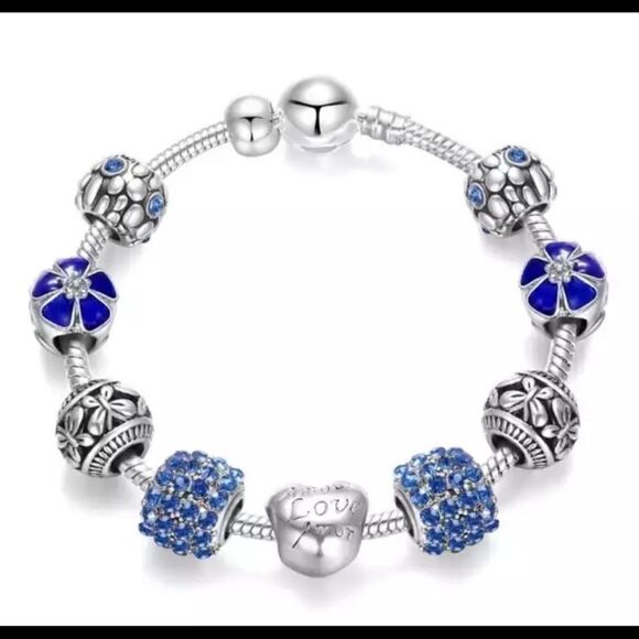 TRENDY BLUE 9 PIECE CHARM BRACELET - Picture 1 of 3